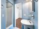 Clean bathroom with light blue walls and a pedestal sink at 1612 Beatrice Dr, Orlando, FL 32810