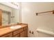 Bathroom with shower, toilet, and wood vanity at 1668 Spring Garden Ct # 1668, Daytona Beach, FL 32117