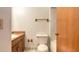 Clean bathroom with toilet, bathtub, and wooden vanity at 1668 Spring Garden Ct # 1668, Daytona Beach, FL 32117