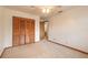 Bedroom with double doors leading to closet and bathroom at 1668 Spring Garden Ct # 1668, Daytona Beach, FL 32117