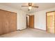 Bedroom with double door closet and access to bathroom at 1668 Spring Garden Ct # 1668, Daytona Beach, FL 32117