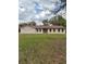 Charming single-story home with a well-maintained lawn and inviting curb appeal at 1870 S Lehigh Dr, Deltona, FL 32738