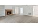 Open living space with fireplace, built-in shelves, and access to other rooms at 1870 S Lehigh Dr, Deltona, FL 32738