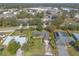 Aerial view of a beautiful home with mature landscaping, a long driveway and great neighborhood at 1930 Seclusion Dr, Port Orange, FL 32128