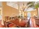 Open dining and living spaces, highlighting the great natural light from the large windows at 1930 Seclusion Dr, Port Orange, FL 32128