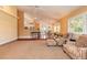 Open-concept living area with a seamless flow from the living room to the dining room and kitchen at 1930 Seclusion Dr, Port Orange, FL 32128