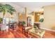 Spacious living area with hardwood floors and a soaring ceiling with an open concept layout at 1930 Seclusion Dr, Port Orange, FL 32128