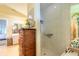 Modern bathroom featuring a walk-in shower with sleek tile work and an adjacent vanity area at 1930 Seclusion Dr, Port Orange, FL 32128