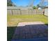Backyard with patio and wooden fence at 213 Lone Pine Dr, Edgewater, FL 32132