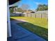 Backyard with patio and grass at 213 Lone Pine Dr, Edgewater, FL 32132