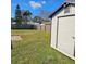 Backyard with shed and grassy area at 213 Lone Pine Dr, Edgewater, FL 32132
