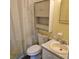 Clean bathroom with a shower/tub combo and linen cabinet at 213 Lone Pine Dr, Edgewater, FL 32132
