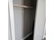 Open closet with a wooden shelf for storage at 213 Lone Pine Dr, Edgewater, FL 32132