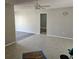 Open living area with wood-look floors and neutral walls at 213 Lone Pine Dr, Edgewater, FL 32132