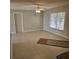 Living room with tile floors and a ceiling fan at 213 Lone Pine Dr, Edgewater, FL 32132