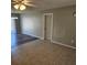 Spacious living area with tile flooring and neutral colors at 213 Lone Pine Dr, Edgewater, FL 32132