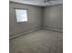 Large main bedroom with carpeted floor and ceiling fan at 213 Lone Pine Dr, Edgewater, FL 32132