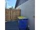 Side yard with gate and trash bin at 213 Lone Pine Dr, Edgewater, FL 32132