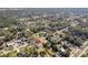 Home location shown in wide aerial view of neighborhood at 2210 5Th Ave, Deland, FL 32724