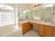 Double vanity bathroom with a large mirror and plenty of cabinet space at 2370 Alton Rd, Deltona, FL 32738