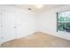 Bright bedroom with closet, window and ceiling fan at 2370 Alton Rd, Deltona, FL 32738