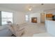 Living Room with recliner and view into kitchen area at 2370 Alton Rd, Deltona, FL 32738