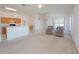 Spacious living room with two recliners and views of the kitchen at 2370 Alton Rd, Deltona, FL 32738