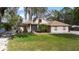 Lovely brick single Gathering home with a well kept lawn and beautiful tree shading at 2424 India Blvd, Deltona, FL 32738