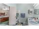 Bathroom with double sinks and a toilet at 2625 Sweet Springs St, Deltona, FL 32738