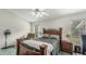 Bright bedroom with window and wood furniture at 2625 Sweet Springs St, Deltona, FL 32738