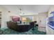 Bright living room featuring large windows and home theater setup at 2625 Sweet Springs St, Deltona, FL 32738