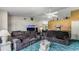 Spacious living room with sectional sofa and large TV at 2625 Sweet Springs St, Deltona, FL 32738