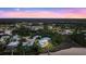 Luxury waterfront home surrounded by tranquil waters and lush greenery at 2806 Bay Vista Ct, New Smyrna Beach, FL 32168