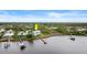 Luxury waterfront home with private dock and beautiful landscaping at 2806 Bay Vista Ct, New Smyrna Beach, FL 32168