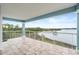Spacious balcony with water views and tile flooring at 2806 Bay Vista Ct, New Smyrna Beach, FL 32168