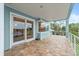 Spacious balcony with tiled floors and water views at 2806 Bay Vista Ct, New Smyrna Beach, FL 32168