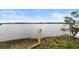 Elevated wooden dock offering waterfront access at 2806 Bay Vista Ct, New Smyrna Beach, FL 32168