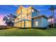Multi-level home with screened porch and lush landscaping at 2806 Bay Vista Ct, New Smyrna Beach, FL 32168