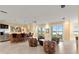 Game room with wet bar, seating area, and water views at 2806 Bay Vista Ct, New Smyrna Beach, FL 32168