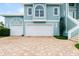 Double-car garage with paver driveway at 2806 Bay Vista Ct, New Smyrna Beach, FL 32168