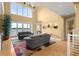 Spacious living area with high ceilings, hardwood floors, and water views at 2806 Bay Vista Ct, New Smyrna Beach, FL 32168