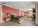 Main bedroom with a fireplace and access to the ensuite bathroom at 2806 Bay Vista Ct, New Smyrna Beach, FL 32168