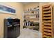 Home office with built-in shelving and ample storage at 2806 Bay Vista Ct, New Smyrna Beach, FL 32168