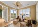 Relaxing sitting area with comfy chairs and water views at 2806 Bay Vista Ct, New Smyrna Beach, FL 32168