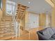 Modern staircase with white railings and wood steps at 2806 Bay Vista Ct, New Smyrna Beach, FL 32168