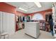 Large walk-in closet with ample storage space and center island at 2806 Bay Vista Ct, New Smyrna Beach, FL 32168