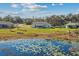 House with a large backyard and lake view at 2909 Desmond Ct, Deltona, FL 32738