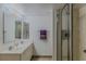 Double vanity bathroom with shower and mirror at 2967 S Atlantic Ave # 1706, Daytona Beach, FL 32118