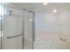 Bathroom with shower and tub at 2967 S Atlantic Ave # 1706, Daytona Beach, FL 32118