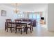 Elegant dining room with chandelier and ocean view at 2967 S Atlantic Ave # 1706, Daytona Beach, FL 32118